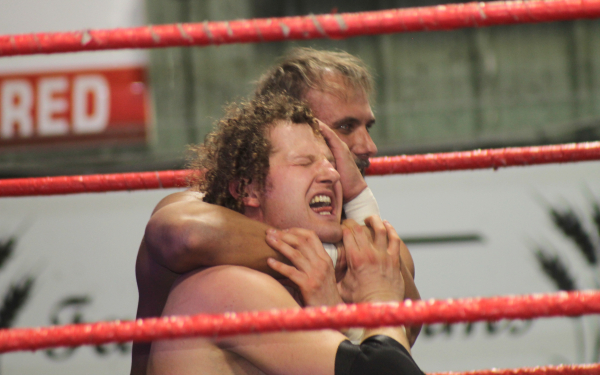 “Sweet” Bobby Schink did not find “Hotshot” Danny Dugan’s “hug” that endearing. On April 24, Melita was treated to an evening of one of the most entertaining sports around, professional wrestling. Enns Brothers Place was alive with heroes and villains, tough talk outside the ring and acrobatic violence inside. Costumes and characters abounded, as did the cheers and boos as the Canadian Wrestling Elite came to town.