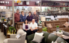 Circle M Furniture new owners, Jamie and Drew Wilkinson (sitting) with previous owners Kevin and Colleen Bridgen (standing on left) 1992-2023, and Sharon and Darwin Slack 1967-1992. 