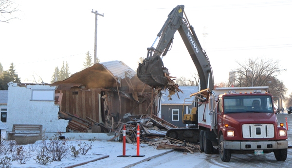 Last week, the old funeral home on Broadway Street in Boissevain came down. The building was owned by Wheatland Funeral Services in Killarney, but has not been used for several years. Recently, Dan Meaud purchased the building and is planning to open a coffee shop and pizza house in the former Ag office located next door. Meaud wanted a more open view of the area for guests in the planned outdoor patio setting.   