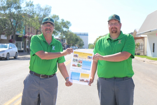 Warren (left) and Kelly Wright show off the poster for the Past to Present Agricultural Parade, set for the streets of Boissevain on Sunday, August 9 starting at 1:30pm. Sponsored by Wright’s Auction Service, they are hoping to show off the different generations of agricultural equipment used in the area, and to give everyone a break from the coronavirus situation. The Wrights have been spending a lot of time organizing the parade, looking around the region for interesting entries.
