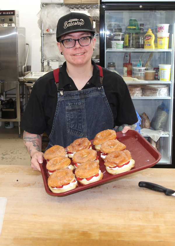 Alex Moody with a tray full of baked treats. Moody and the Boissevain Bakeshop won Small Business of the Year from Tourism Manitoba.