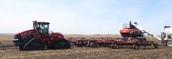 Froese Family Farms add fertilzer to their drill to go with the canola they were seeding earlier this week, northwest of Boissevain. Although the weather has been cool and dry, it has worked well for getting the crops in the ground, with much of it already done. There are concerns on the horizon about the loss of Canadian canola markets in China, but the most immediate need is rain. A wet period is predicted soon, starting on Friday. 