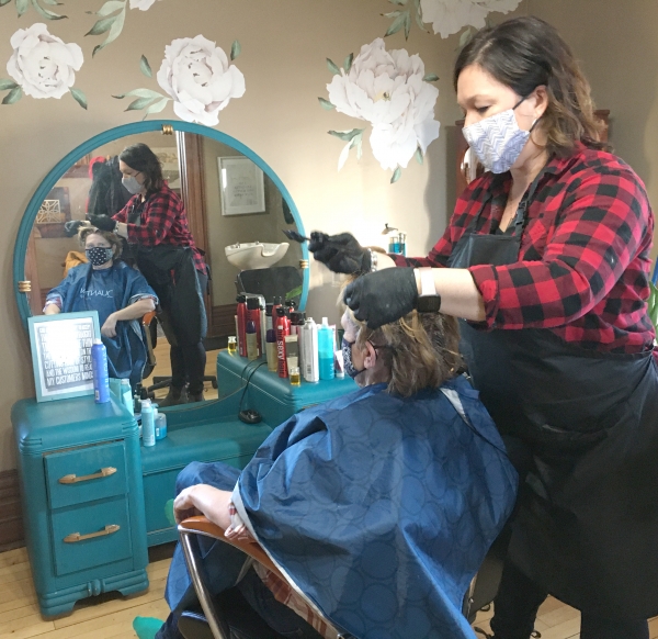 Chanlie Kozak operates The Powder Room salon in Souris and is thrilled to be able to begin servicing her clients now that limited restrictions will allow her to get back to work. Kozak is seen here working with her long-term client, Barb Falloon who is also very pleased to get back to the salon.