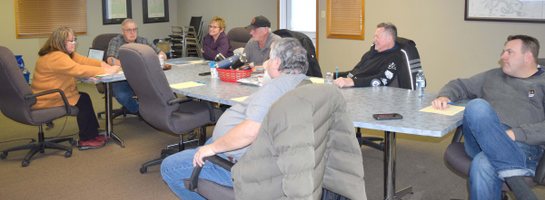CEO Pam Hainsworth of the Municipality of Deloraine-Winchester gave the good news to council on January 22 that the new aquatic center in Deloraine came under budget, saving the community $426,722. (L-R): CAO Pamela Hainsworth, Reeve Kelly McMechan, Deputy Reeve Debbie Adams and councillors Jerry Redden, Cliff Kirkwood, Brent Wells and Brian Lasko.  Missing from photo Councillor Kevin Weidenhamer.	PHOTO BY JUDY WELLS