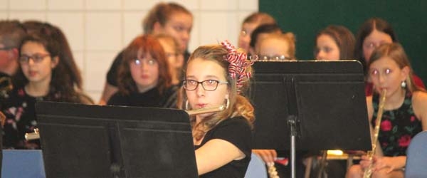 Ayla Lake of the Grade 7 band contributes flute to “Here Comes Winter Wonderland” during the Boissevain Broncos Band &amp; Choir Christmas concert held on Tuesday, December 11. 