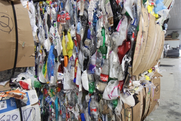 There is no sorting of recycling currently at the local recycling depot, with the cans, glass and plastic that is being collected now being baled (as shown above) together. Previously, the recylcing depot separated the products and sold to various outlets, but with the social distancing rules implemented because of COVID-19, volunteers are not sorting product. Now, instead of making money on recycled items, the local facility has to pay freight to ship the non-sorted baled recycling to a central depot.