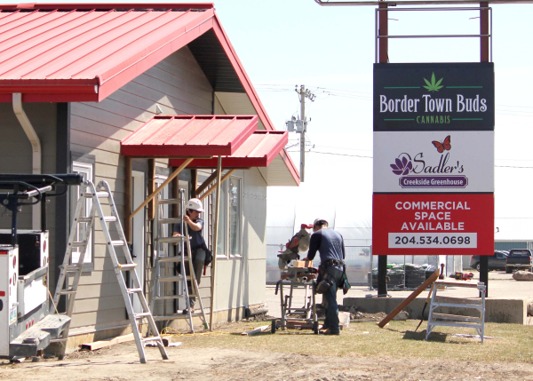 Parkside Construction crew work on the exterior of the old Red Coat Inn building in Boissevain where motel rooms will be located. The building is starting to see some action, with the new cannabis shop opening earlier this week, and work ongoing by part owners Gene and Patti Unrau. A four-room motel is planned, with the intention of opening a beer vendor in the building as well. 