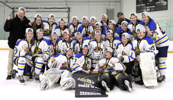 The Westman Wildcats completed a three game sweep against the Winnipeg Ice to win the Manitoba Female Hockey League Championship, winning the final game in the best of five 5-2 on Friday, April 1 on home ice at Hartney, Manitoba. Back row (L-R): Head Coach Guy Williams, Assistant Coach Megan Robertson, Sophia Anderson, Hayley Kolosky, Callie Hillhorst, Brooklyn Franklin, Callie Rice, Assistant Coach Chris Page, Paige Kozak, Marlee Rutherford, Goalie Coach Dan Averill, Kelsey Huibers, Mia McGregor, Karlyn Gudz. Middle (kneeling): Kamryn Cloet, Erica Stutsky, Madison Weber, Addison Vines, Hallie Franklin, Emma Ramsey, Kelsey Page, Danica Averill(AP), Clair Merckx (AP). Front: Grace Glover, Makenna Beard, Peyton Murray.  