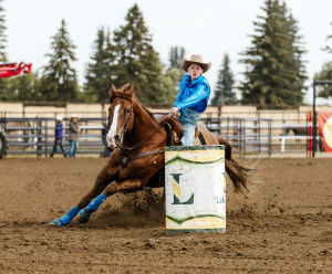 Lexi Janssens riding Daisy around the barrels. The Manitoba High School Rodeo has many local riders, including the Janssens sisters from Boissevain.