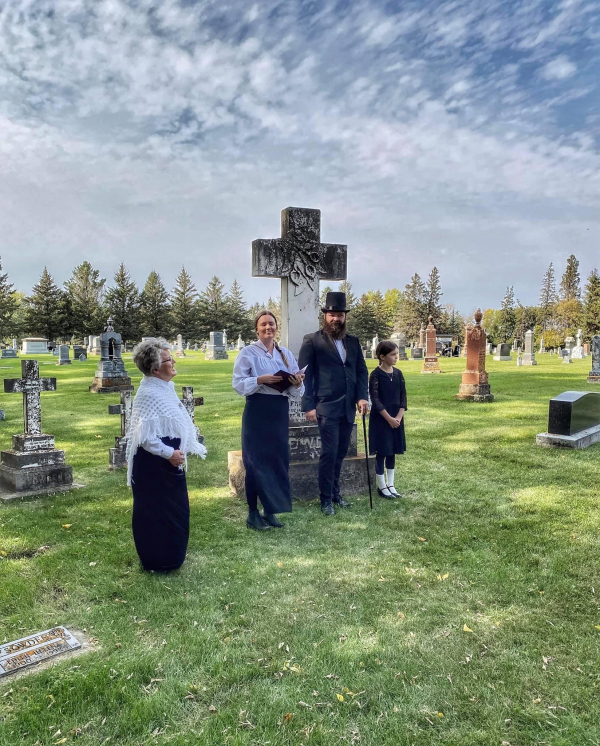 Heather Williams (left), Cassie Quadrelli, Evan Poncsak and their daughter Ellie perform in the Gossip in the Graveyard event in Souris during Harvest Days.